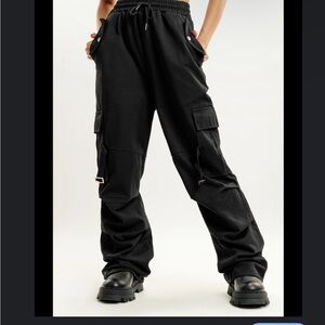 black cargo-style trousers